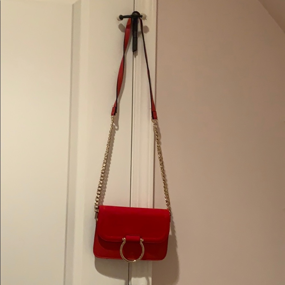 Red leather and suede with gold hardware